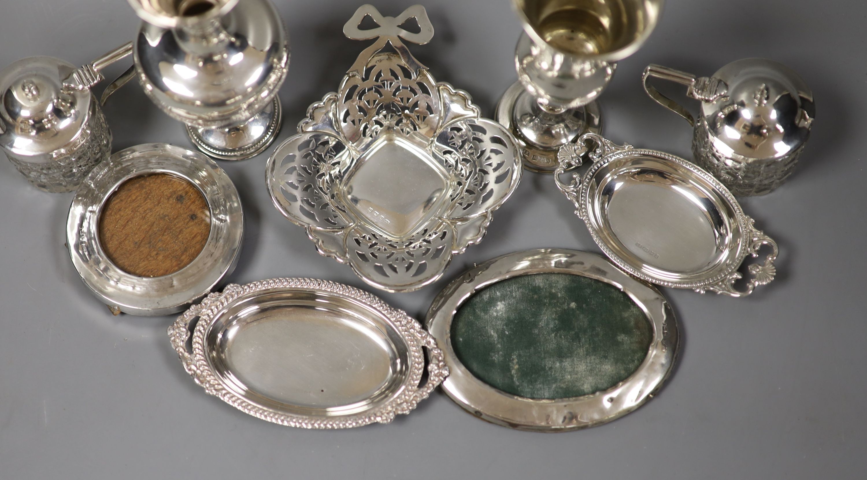 A small silver dish and other sundry silver including kiddush cup, 925 vase, miniature trays and photograph frames.